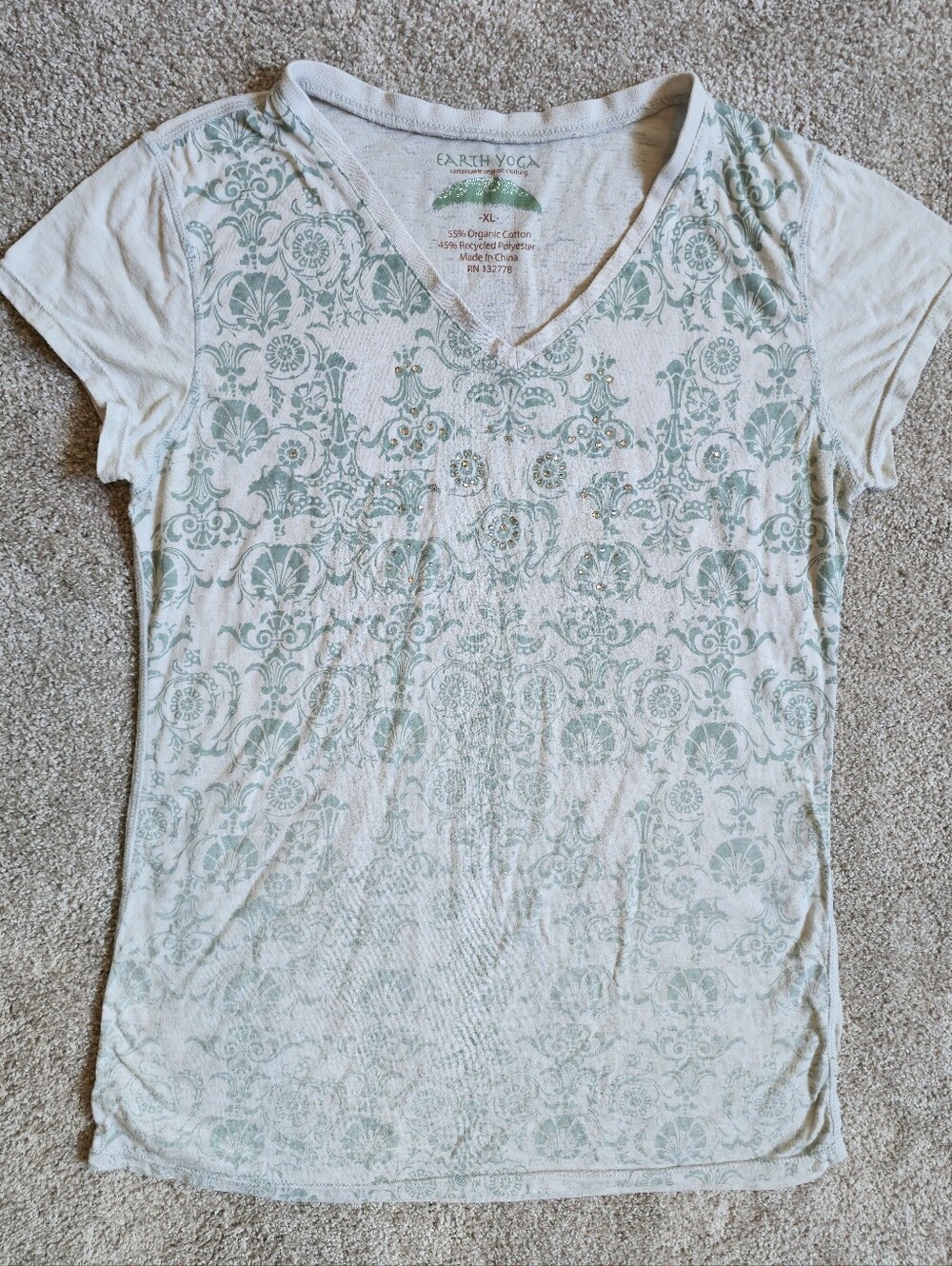 Earth Yoga green-and-white damask print V-neck tee featuring a soft organic...
